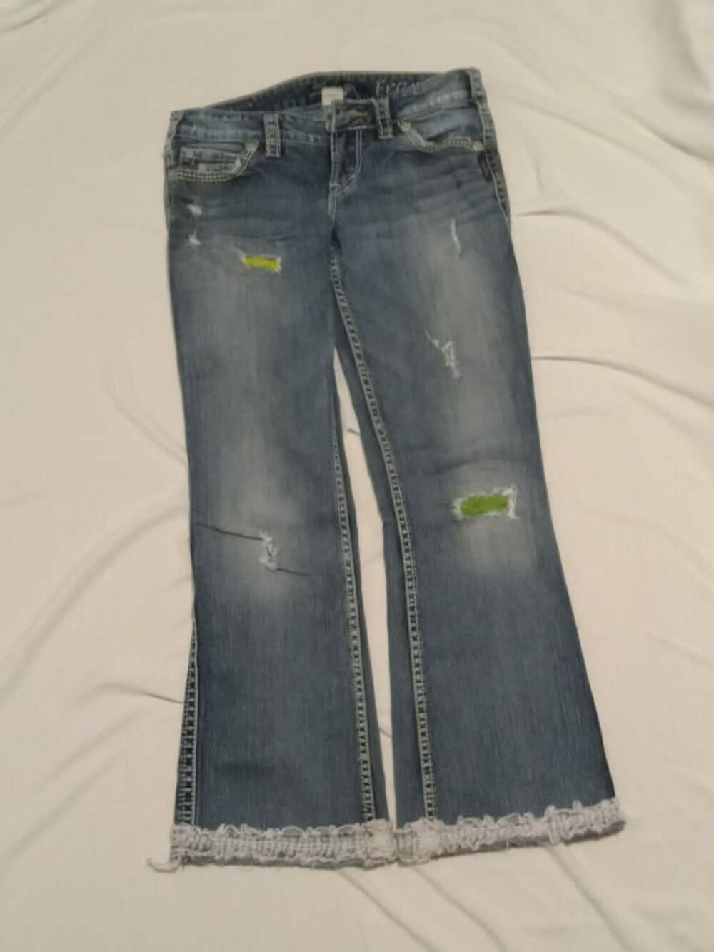 Uncycled low waist blue Silver jeans with patches size 27